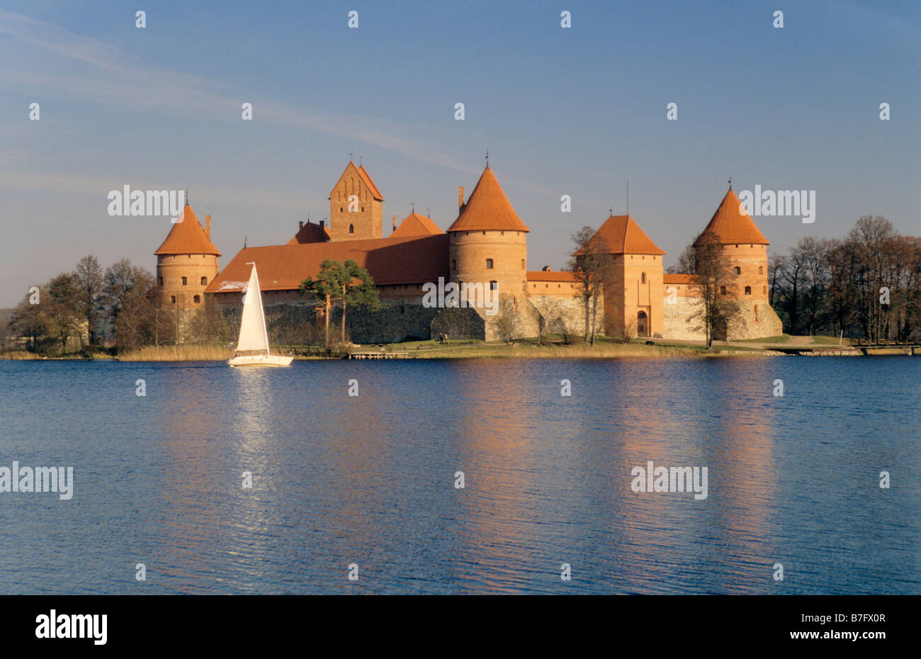 Sailboat near Island Castle at Lake Galve in Trakai, Lithuania Stock Photo