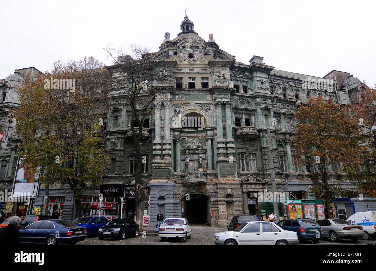 Dilapidated facade of an old majestic building in central Odessa, Ukraine. Stock Photo