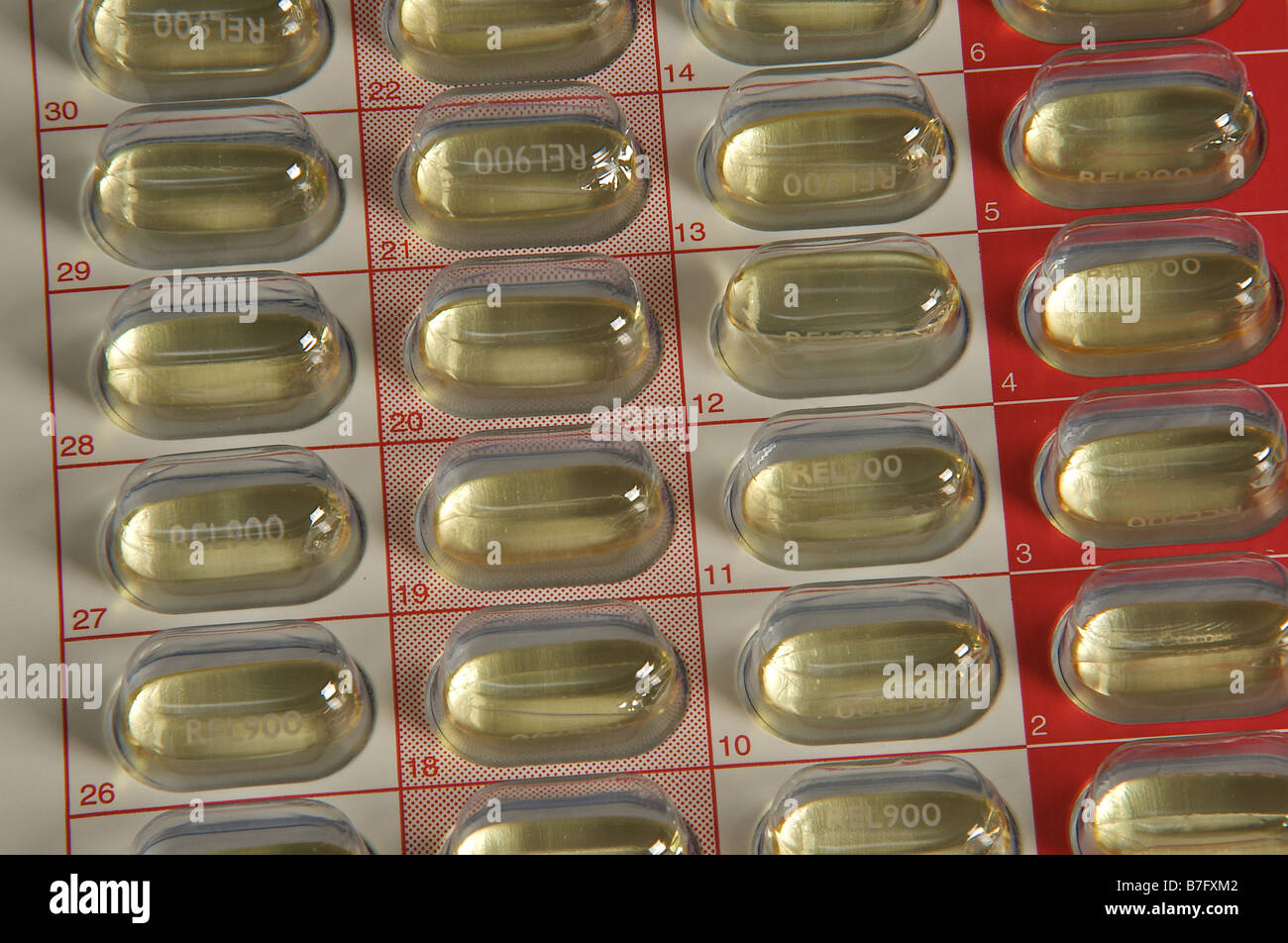 capsules in a unit dose dispensing system Stock Photo
