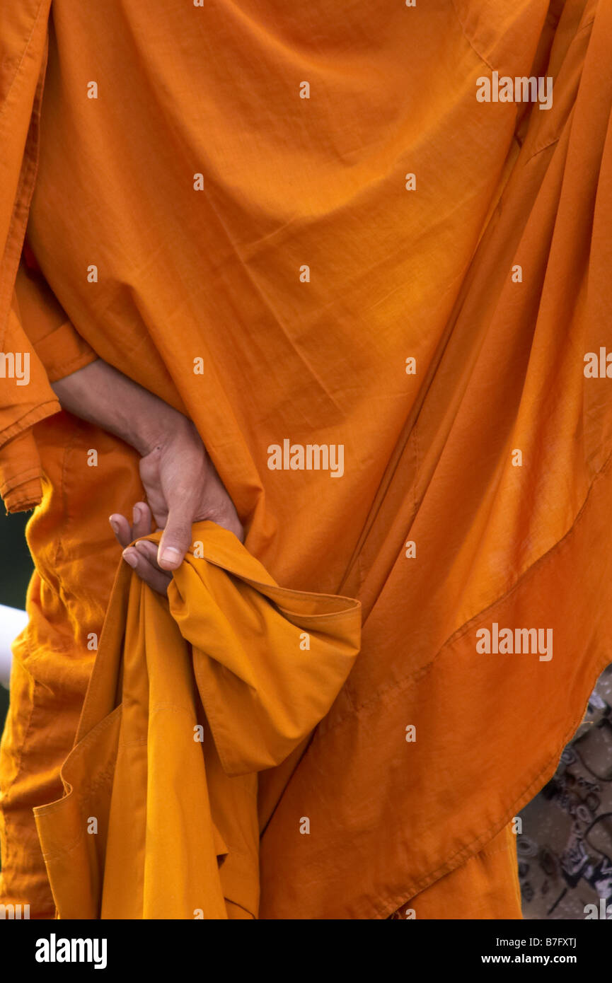 The saffron orange robes of a buddhist monk Stock Photo Alamy