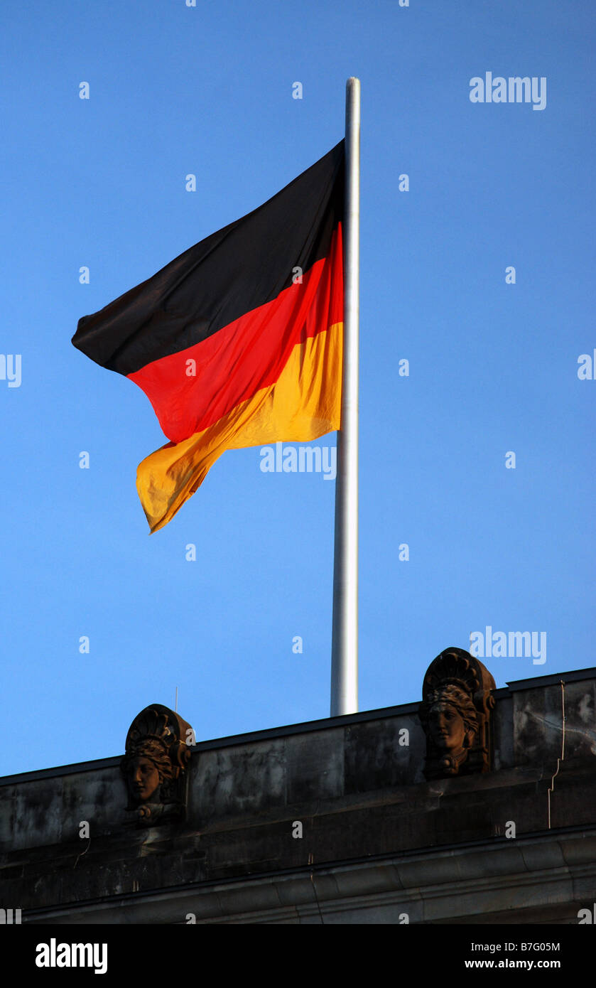 German flag on top of the Reichstag building Stock Photo
