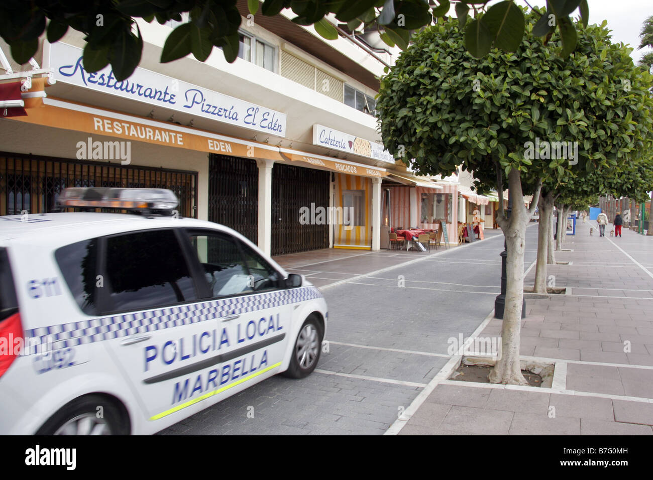 Police car driving through a street in Marbella Costa Del Sol Spain ...
