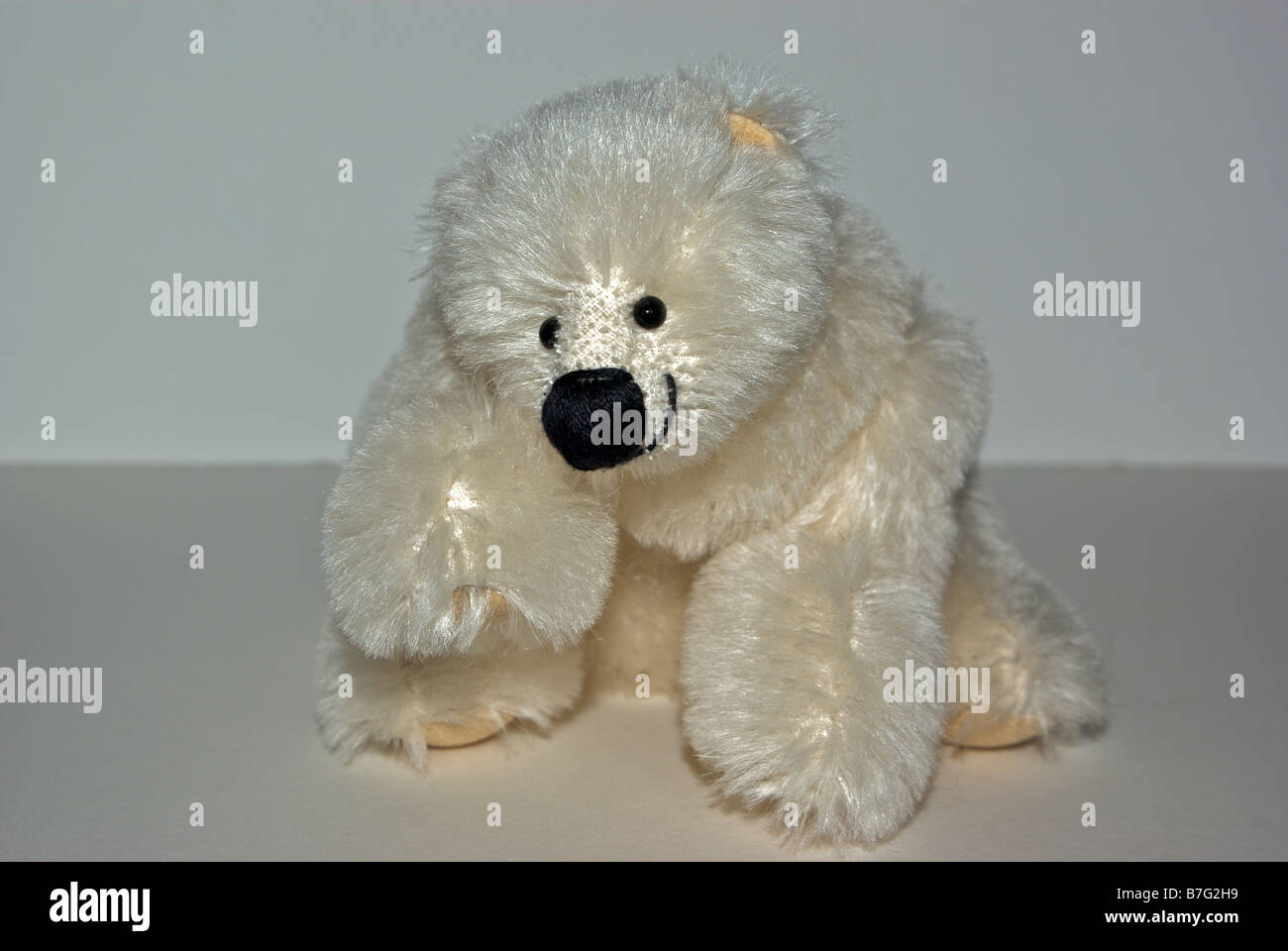 Hand crafted stuffed articulated plush toy polar bear Stock Photo