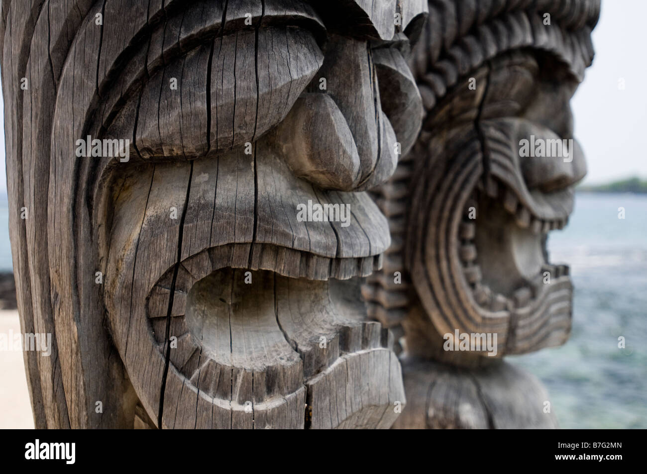 Ki'i carved statues in Puuhonua o Honaunau. Stock Photo