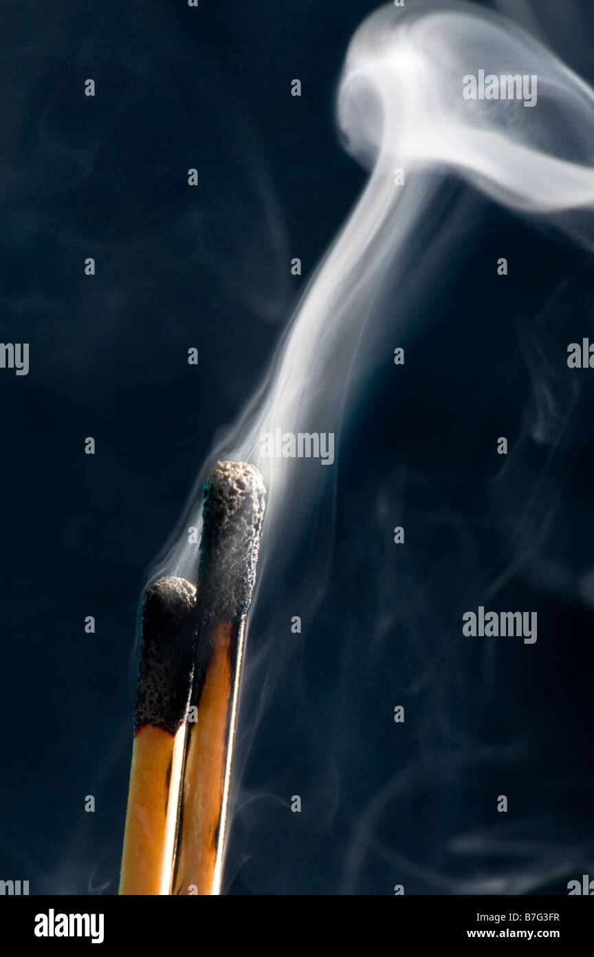 object on black match with smoke Stock Photo Alamy