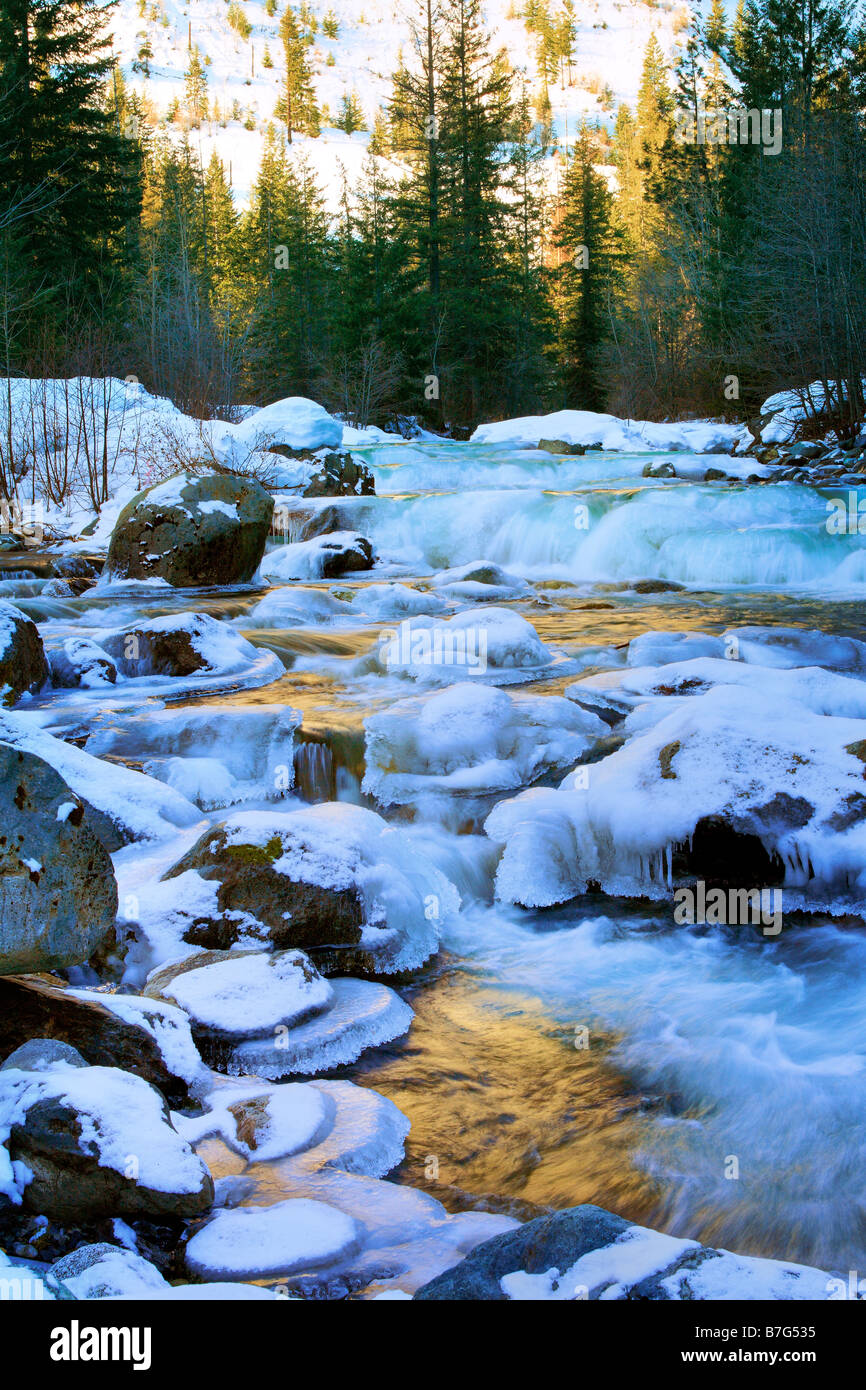 Creek near Blewett Pass, Washington mostly frozen in winter Stock Photo