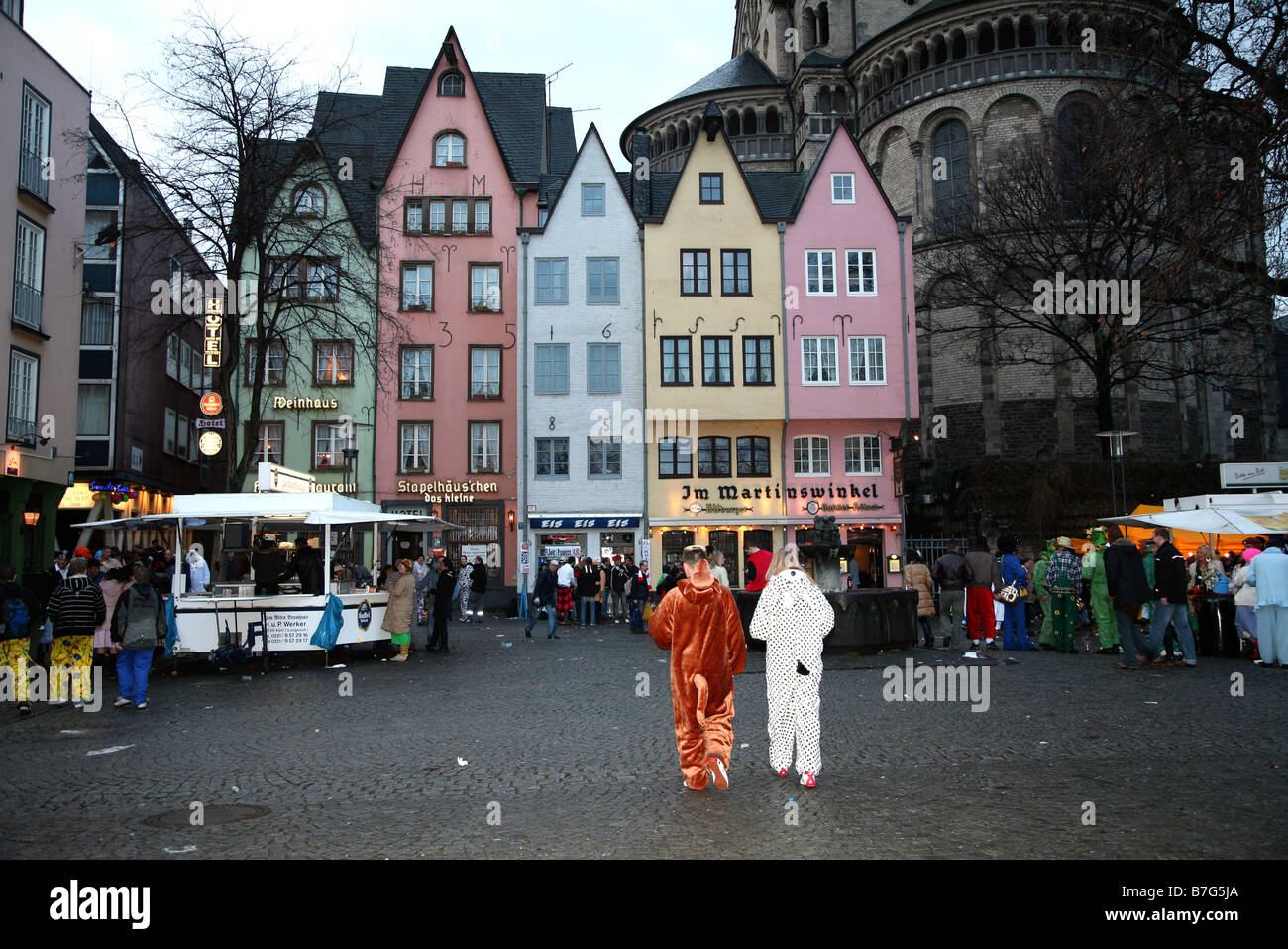 Carnival goers in Altstadt, Old Quarter of Cologne, Germany Stock Photo