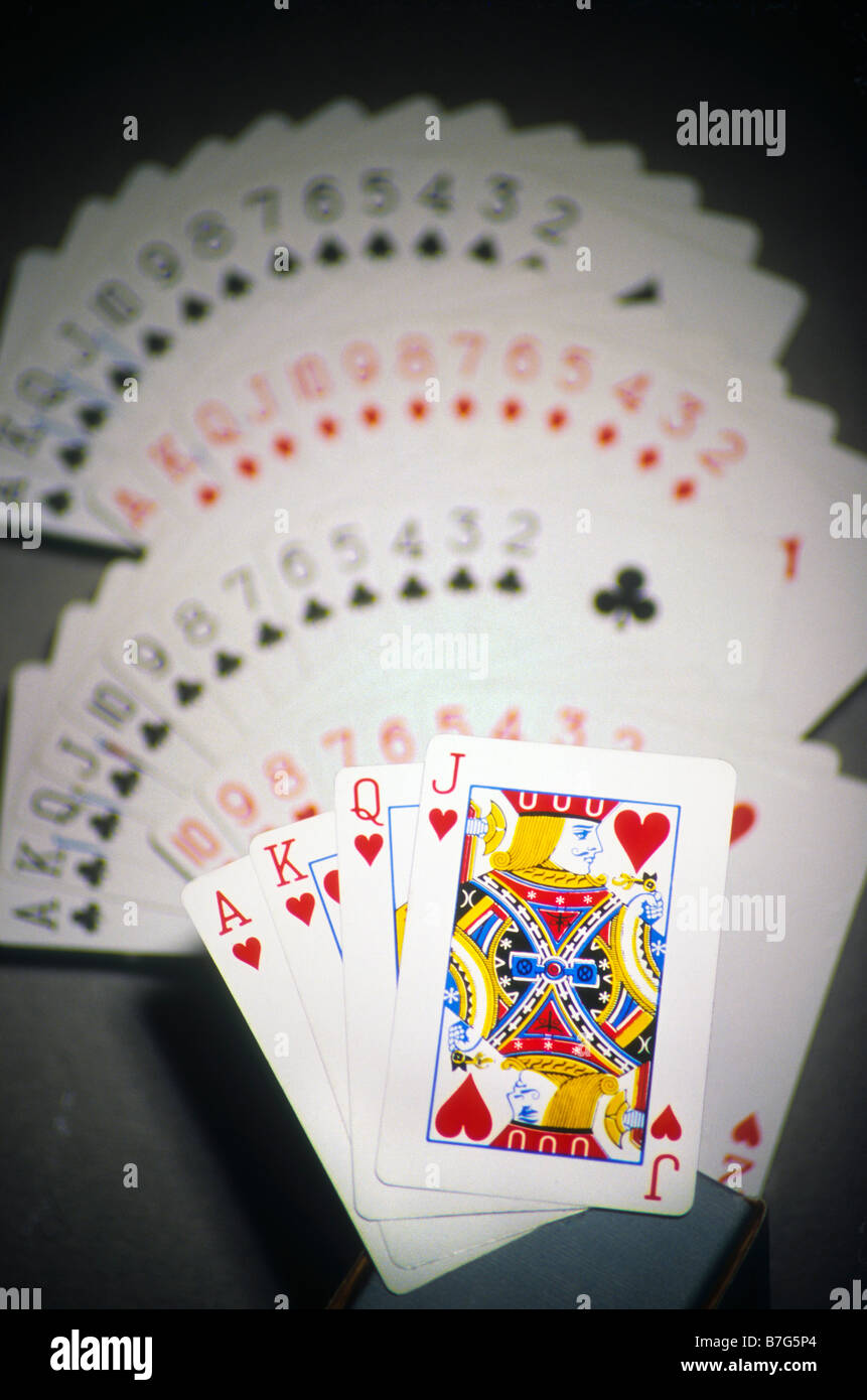 Deck of playing cards spread out to show all cards with Royal Flush of ...