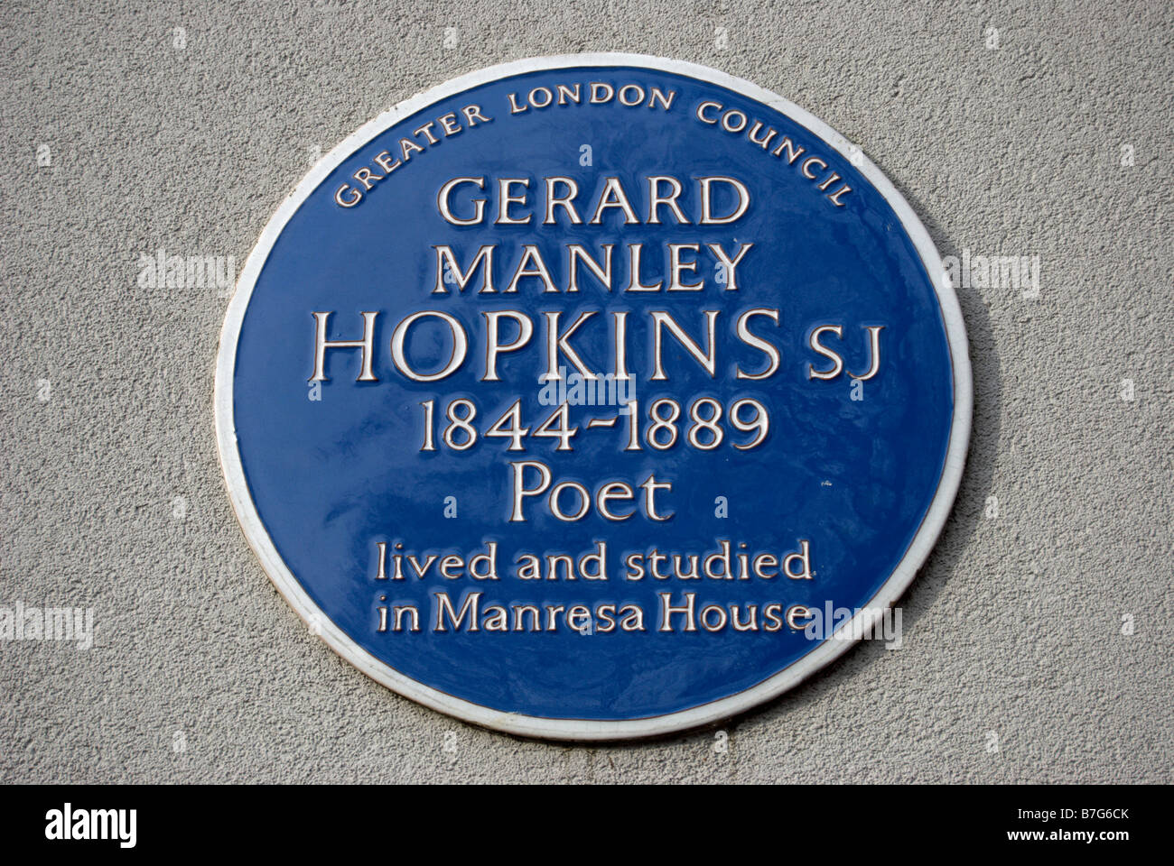 greater london council blue plaque marking a former home of poet gerard manley hopkins, roehampton, southwest london, england Stock Photo