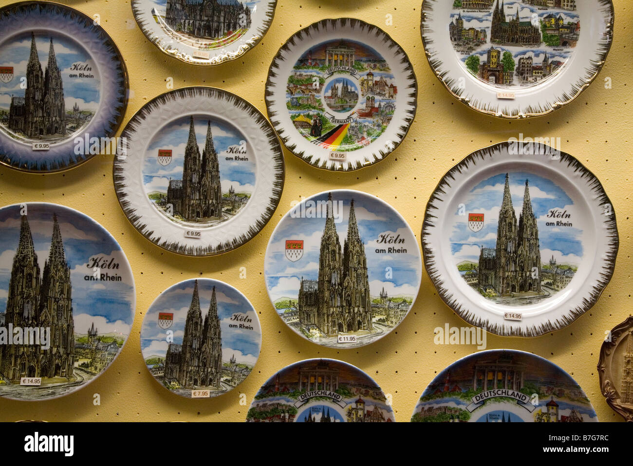 Souvenir plates on sale depicting Cologne Cathedral, Germany Stock Photo