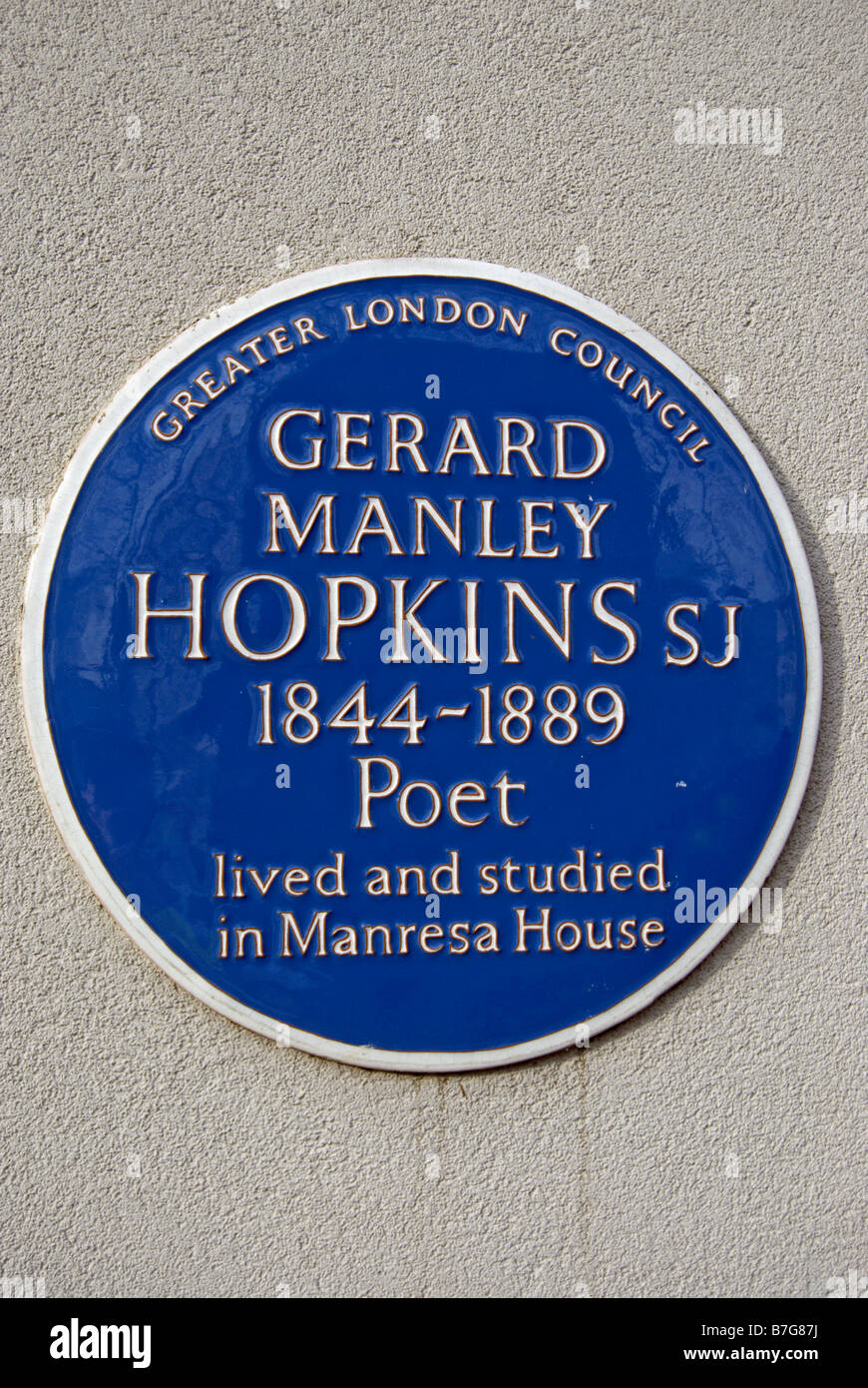 greater london council blue plaque marking a former home of poet gerard manley hopkins, roehampton, southwest london, england Stock Photo