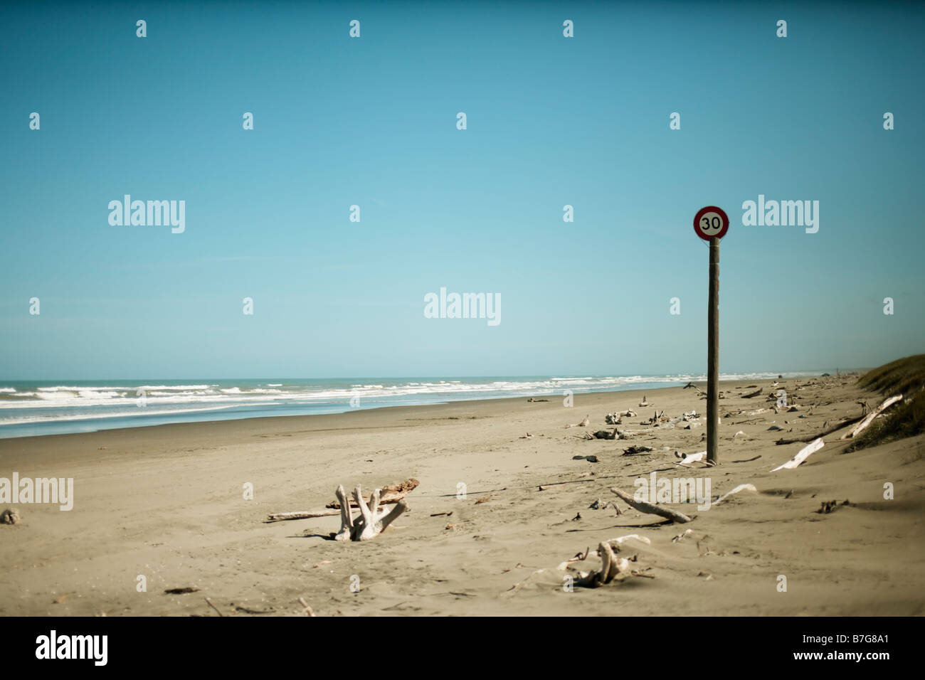 30kph Speed Limit signpost Himatangi beach New Zealand Stock Photo