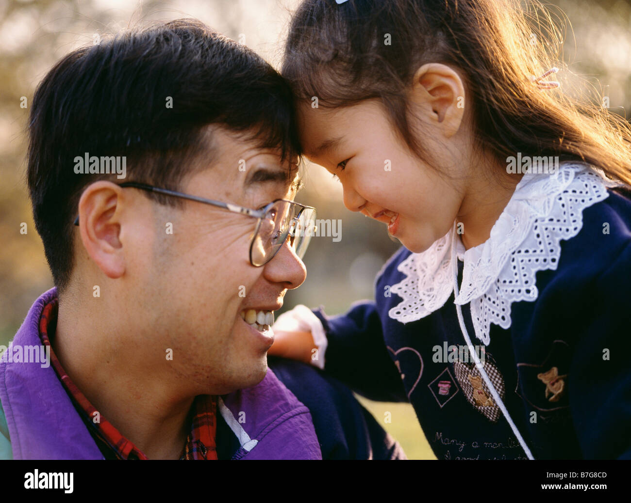 Japanese father daughter play together hires stock photography and