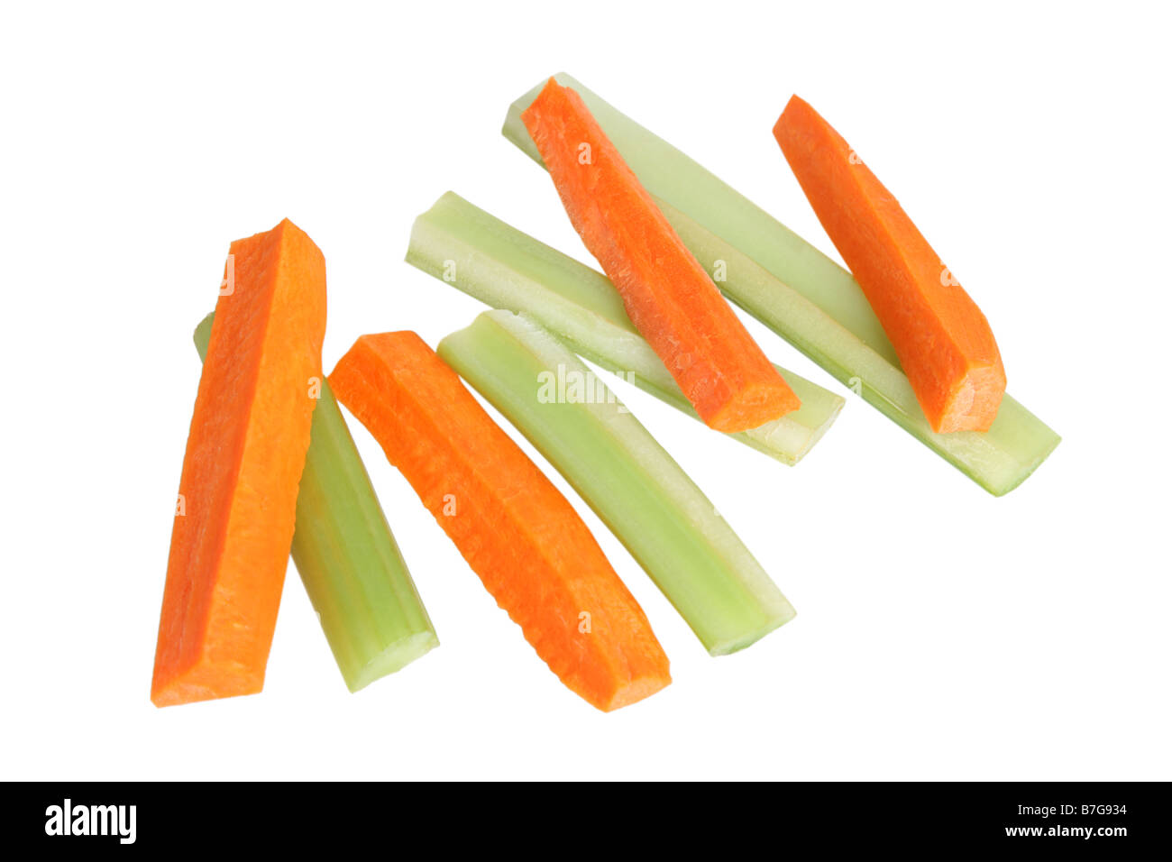 Celery and Carrot sticks cut out on white background Stock Photo