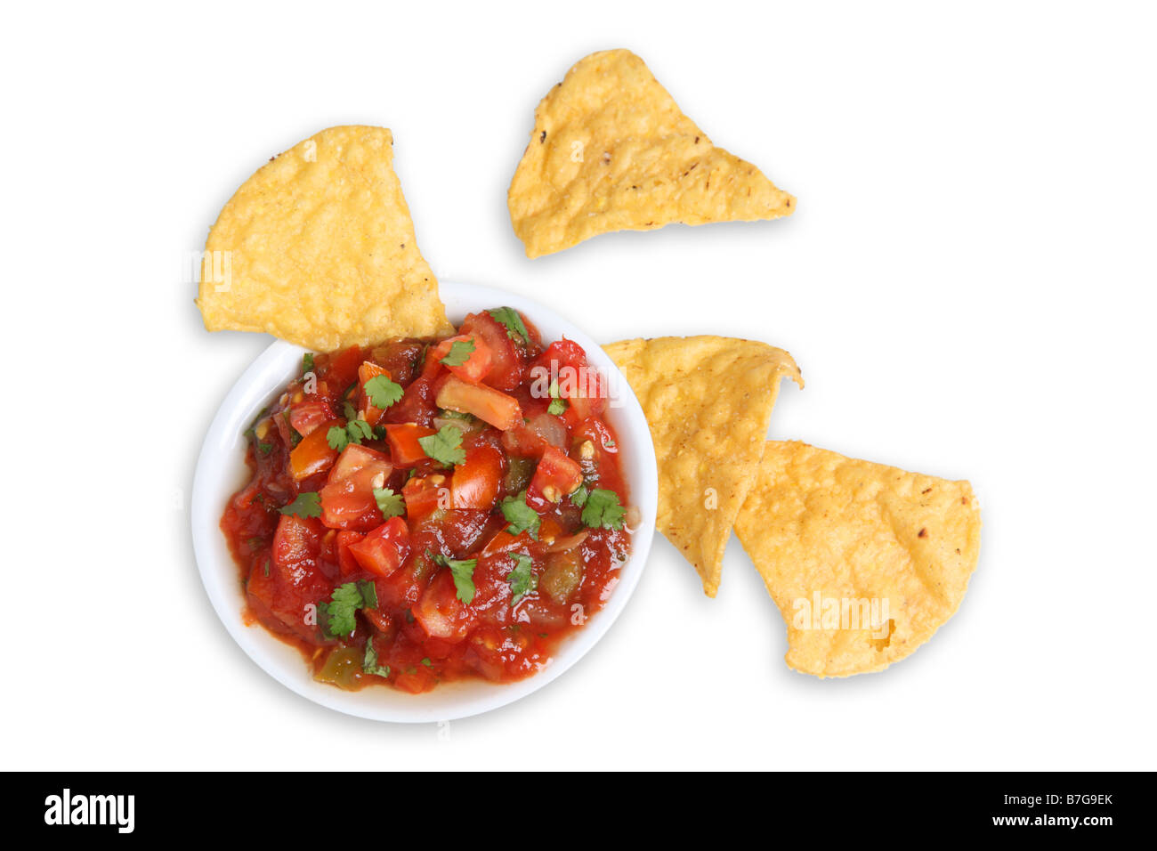 Salsa and tortilla chips cut out on white background Stock Photo