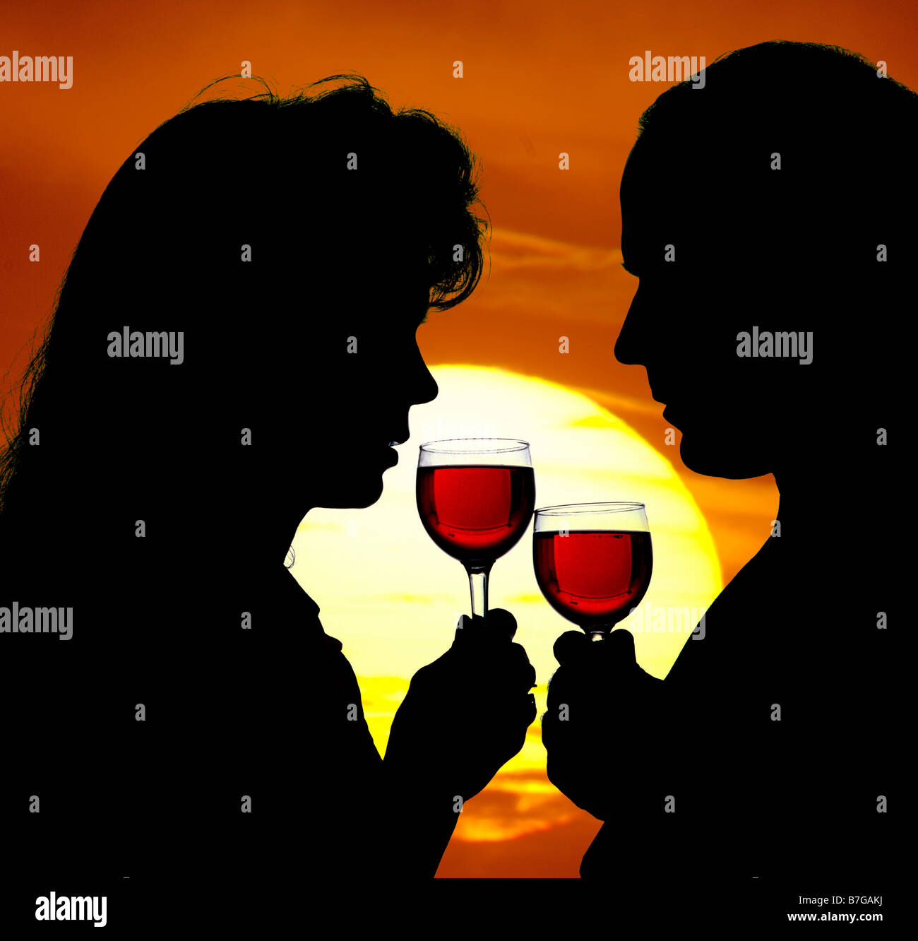 Silhouette couple drinking wine sunset hi-res stock photography and ...