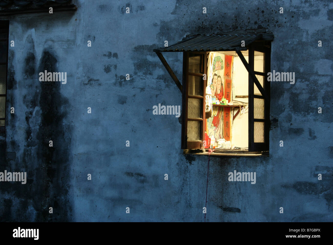 View through a window of old house in Tong Li, China Stock Photo