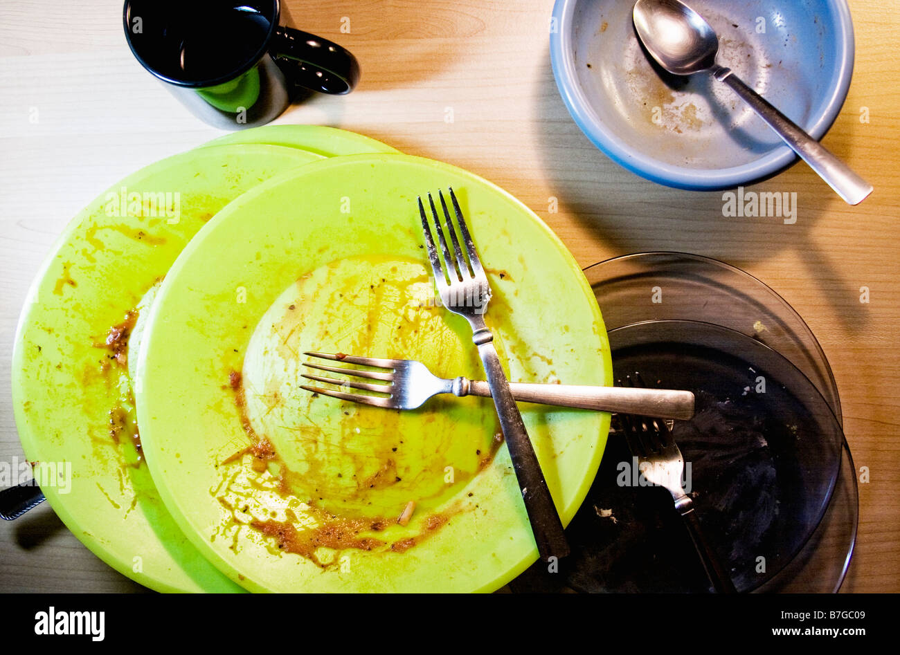 Finished meal with dirty dishes. Stock Photo