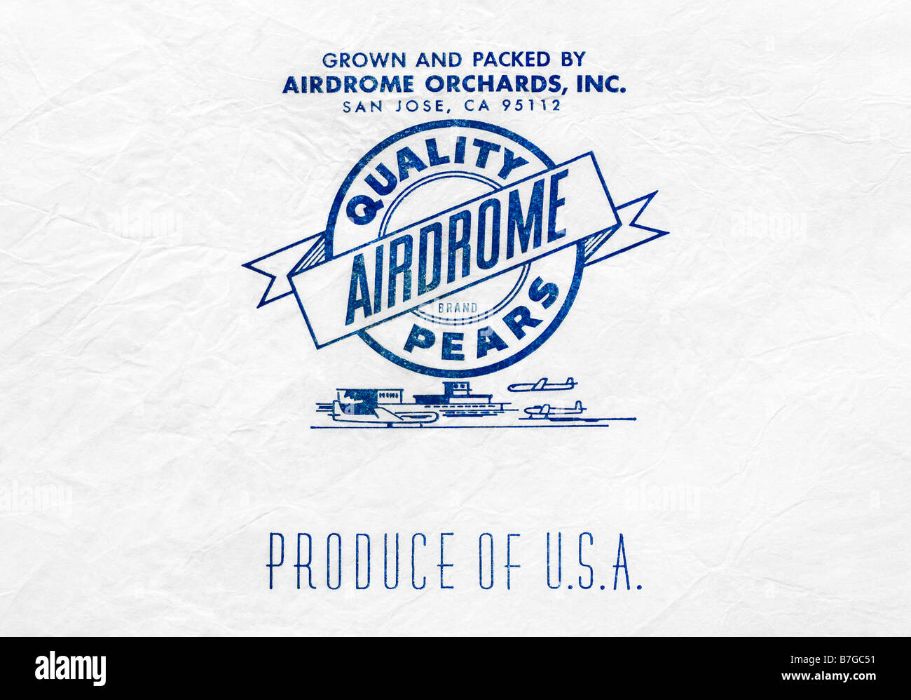 Printed ephemera / Pear fruit wrapper from USA - Blue Seal / Airdrome circle logo on tissue paper. Stock Photo