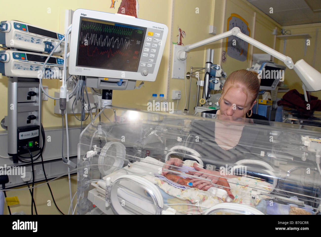 Mum looks after her premature baby UK Stock Photo