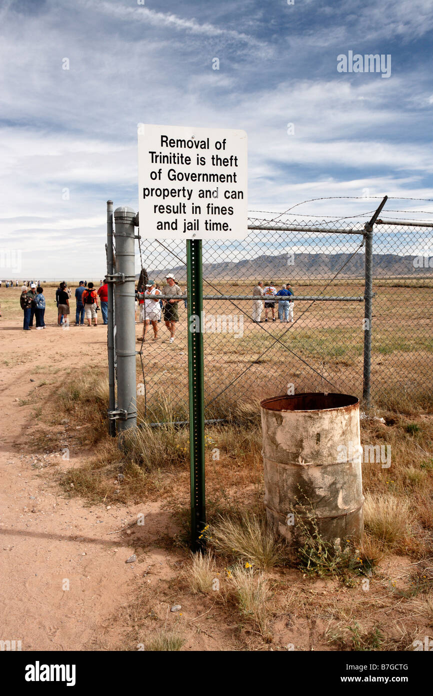 A US government sign at the entrance to Trinity Site, NM, warns visitors that removal of Trinitite is illegal. Stock Photo