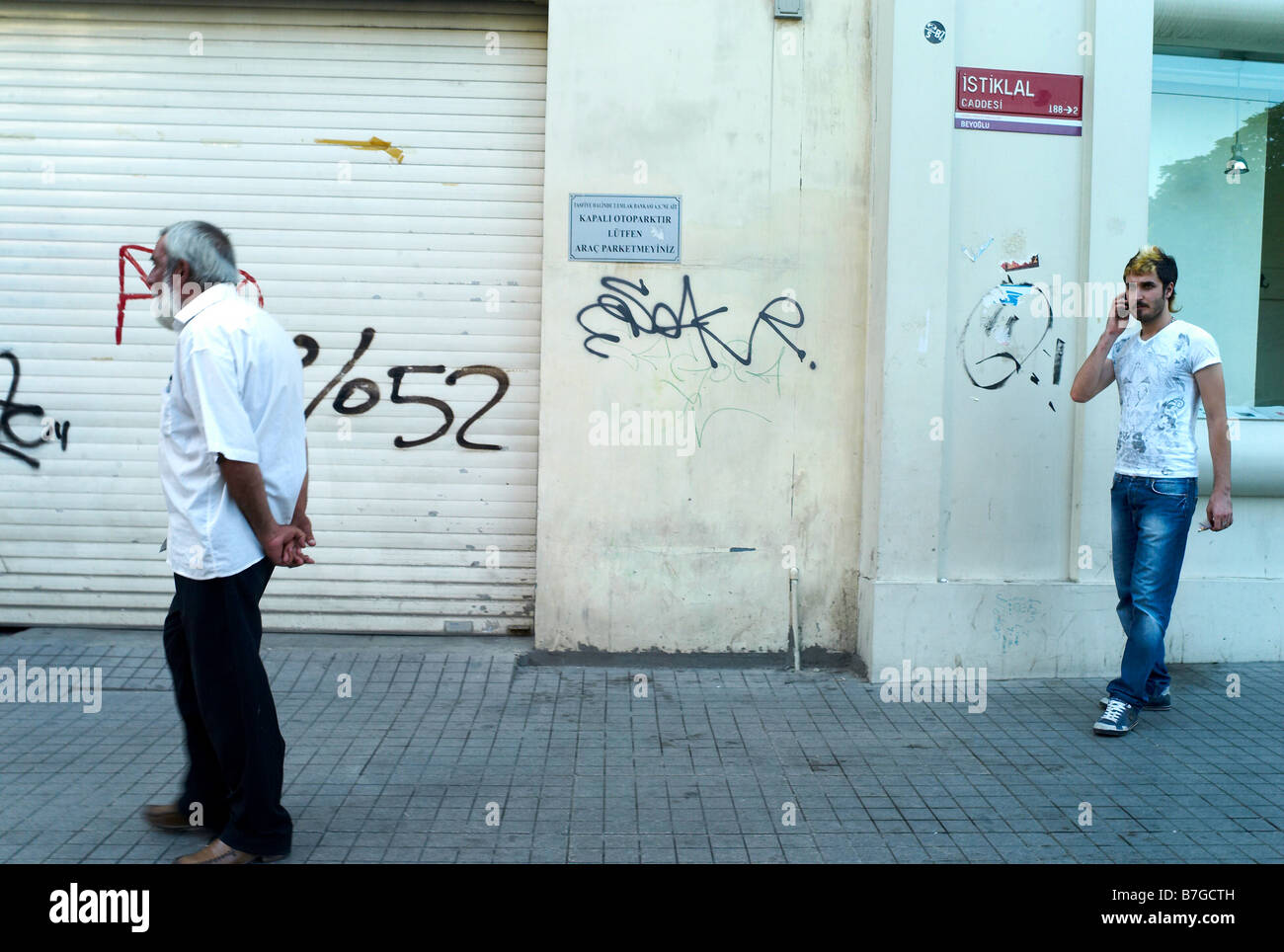 Turkish men walking in Taksim in Istanbul Turkey Stock Photo