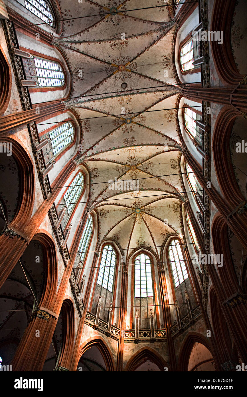 Decorated ceiling and windows in the Marienkirche St Marys church third largest church in Germany Lubeck Stock Photo