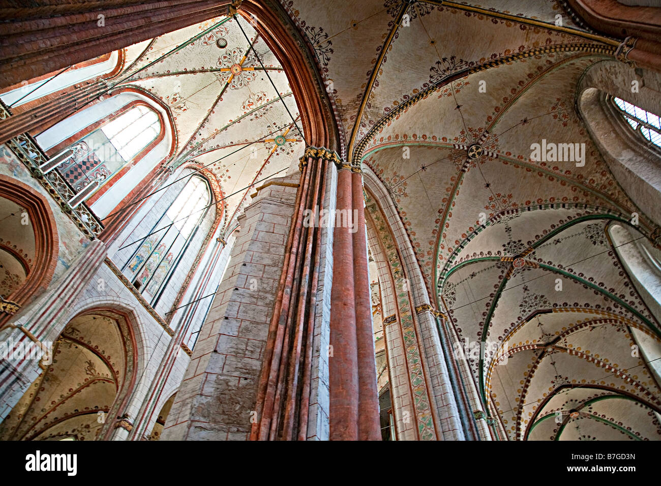Decorated ceiling and windows in the Marienkirche St Marys church third largest church in Germany Lubeck Stock Photo