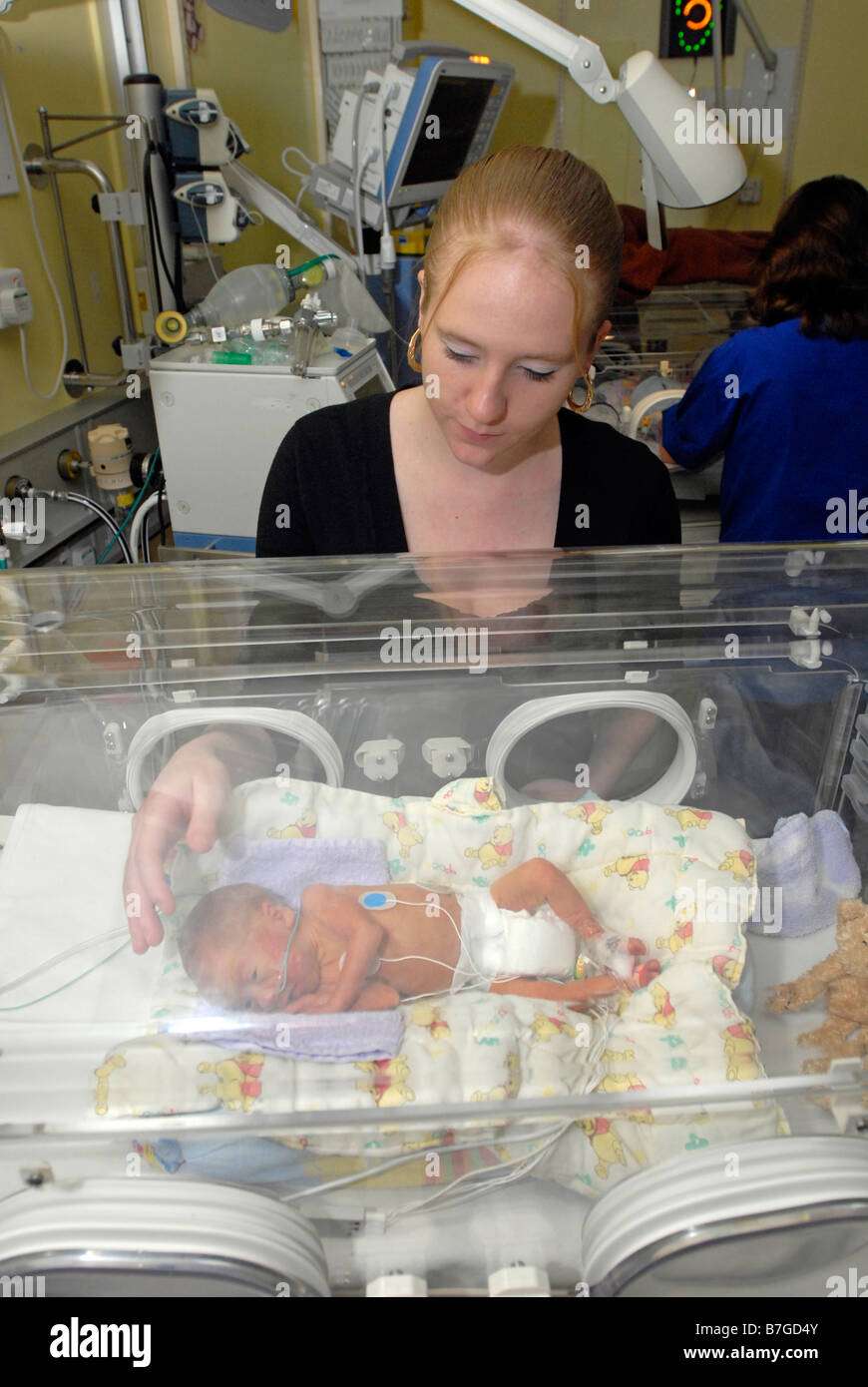 Mum looks after her premature baby UK Stock Photo