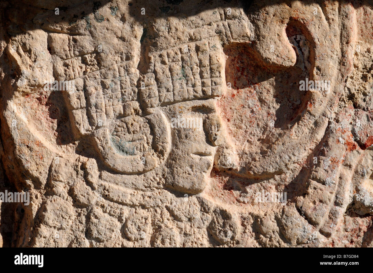 Stone wall carving of Mayan warrior, Chichen Itza, Mexico Stock Photo