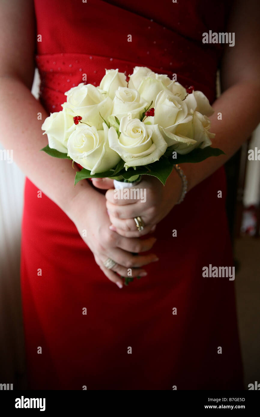 bridesmaid hold bouquet of flowers Stock Photo Alamy