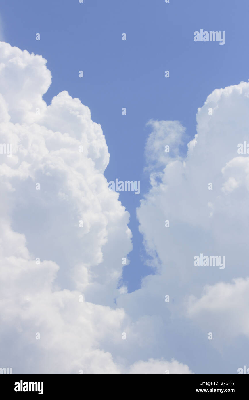 cumulus clouds in a v notch formation Stock Photo