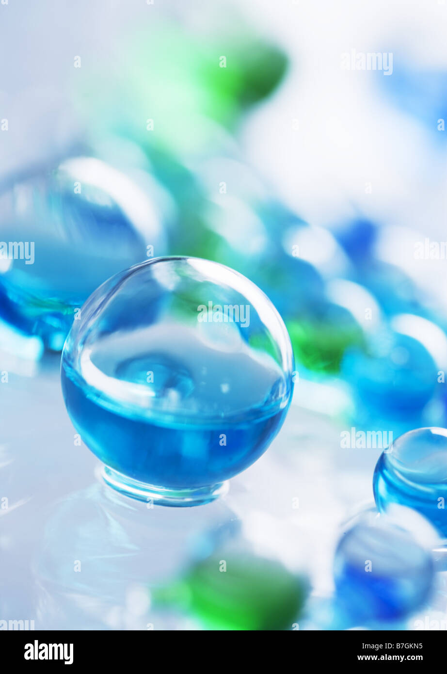 Glass balls floating on water Stock Photo Alamy
