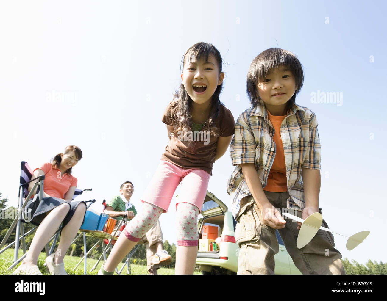 Children playing with toy plane Stock Photo - Alamy