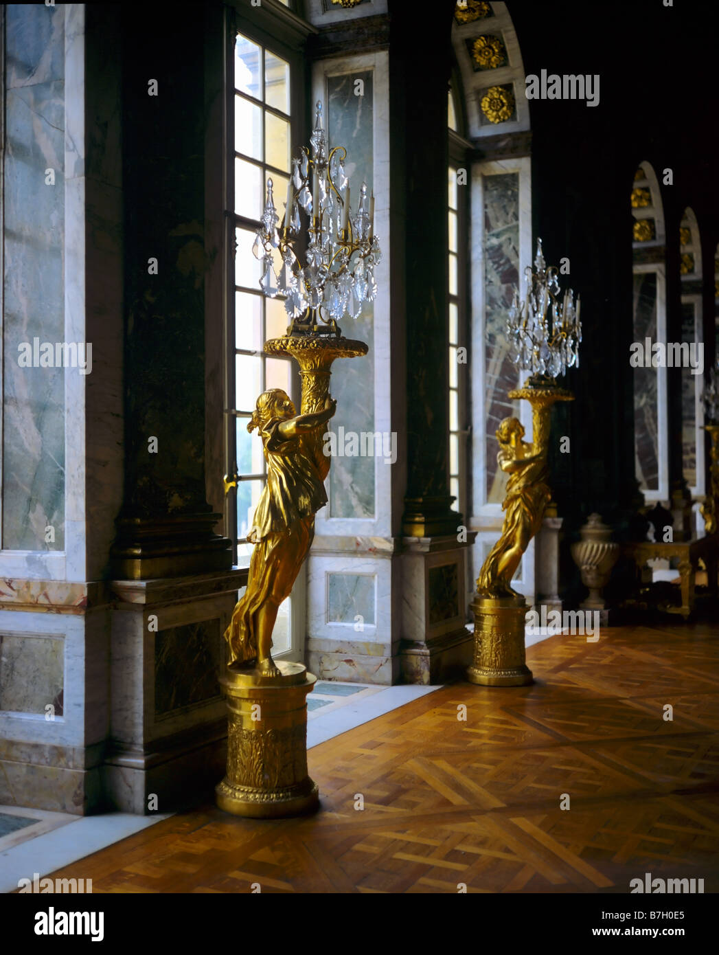 Candelabras in Hall of mirrors Chateau de Versailles Yvelines Ile-de-France France Europe Stock Photo