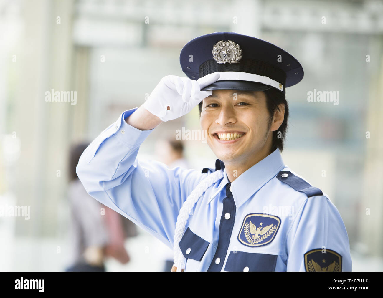A smiling security guard Stock Photo Alamy