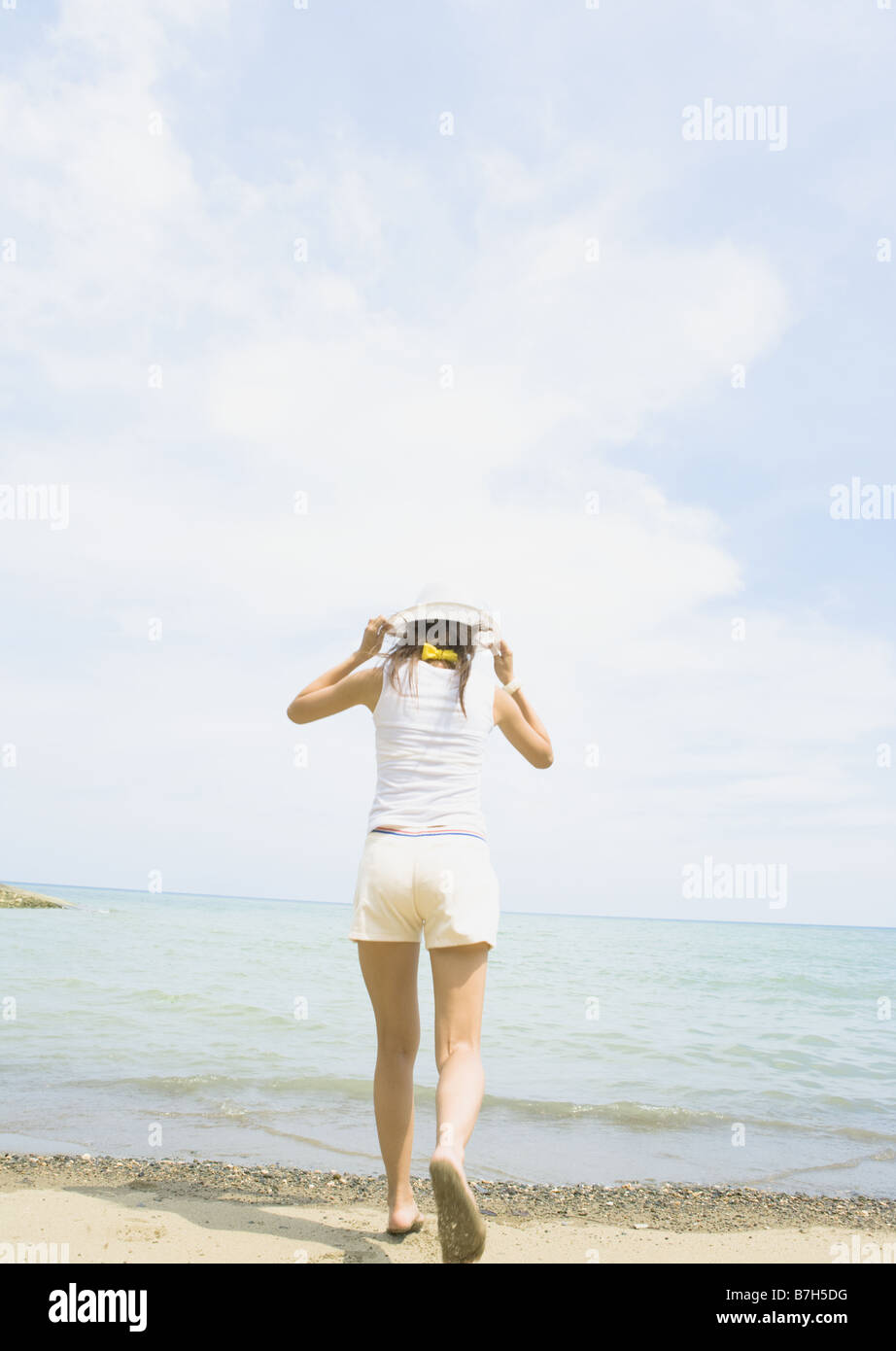 Woman on the sandy beach Stock Photo