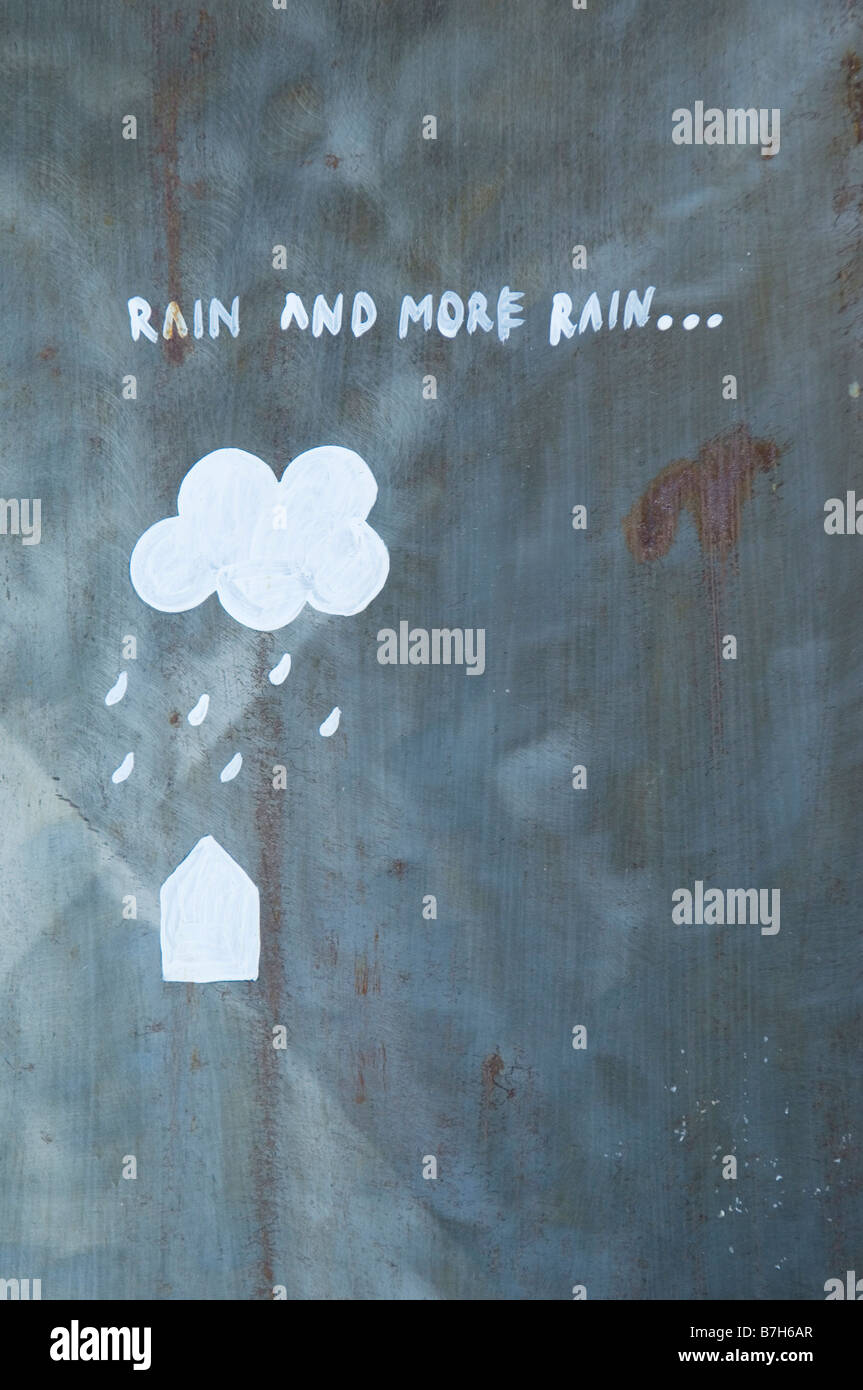Painting and text on steel wall of raining weather icon Stock Photo