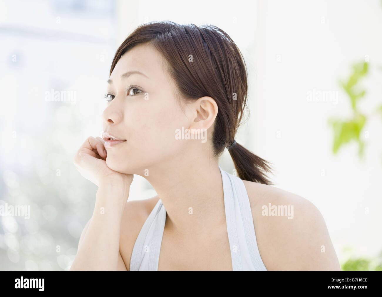 Resting chin on upper body hi-res stock photography and images - Alamy