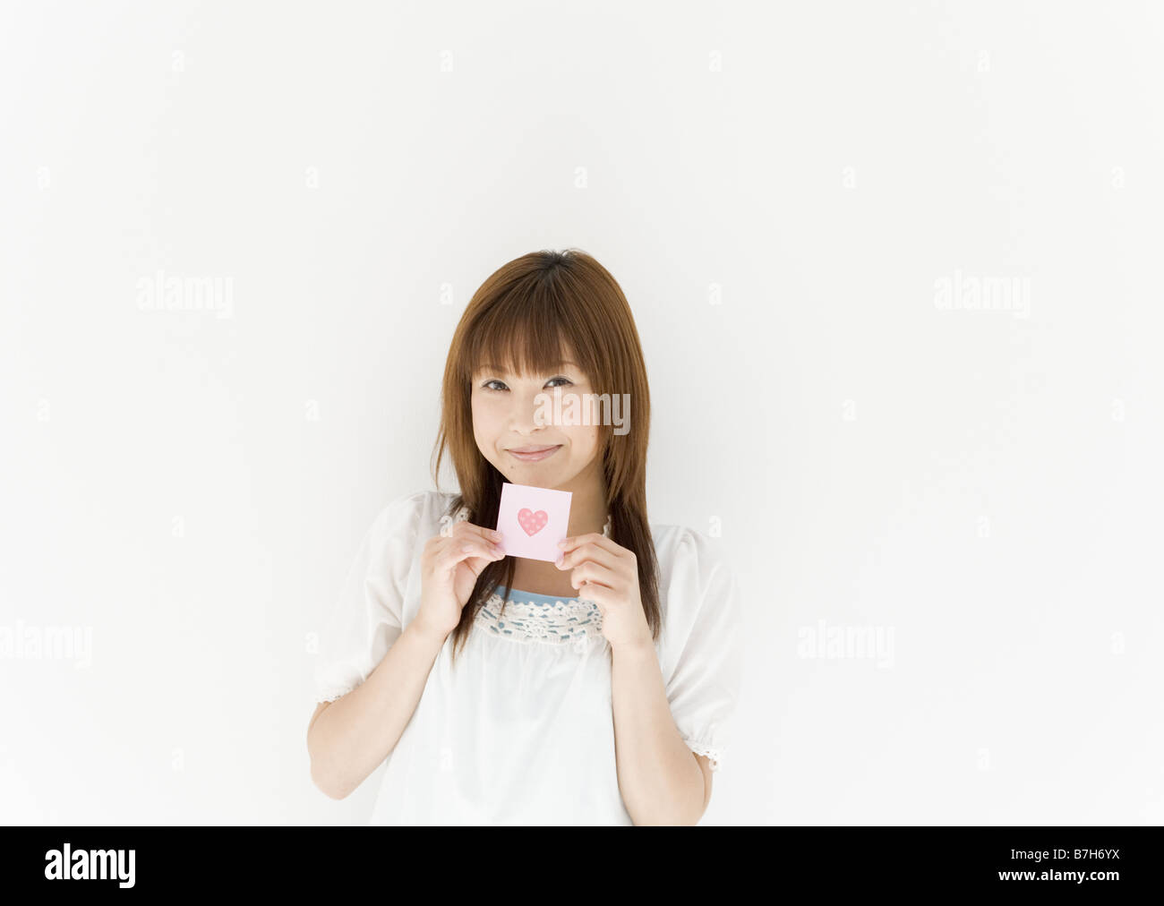 Woman Holding Heart Drawing Stock Photo - Alamy
