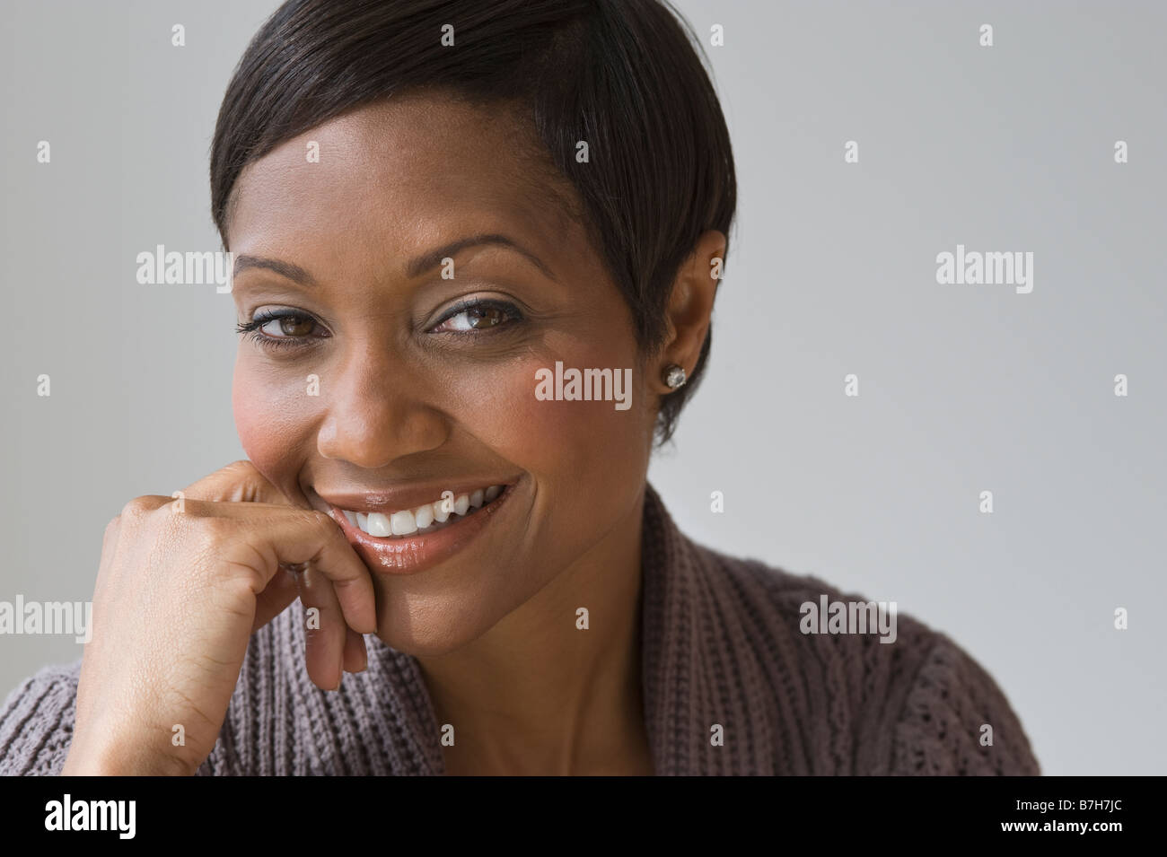 Confident African woman smiling Stock Photo - Alamy