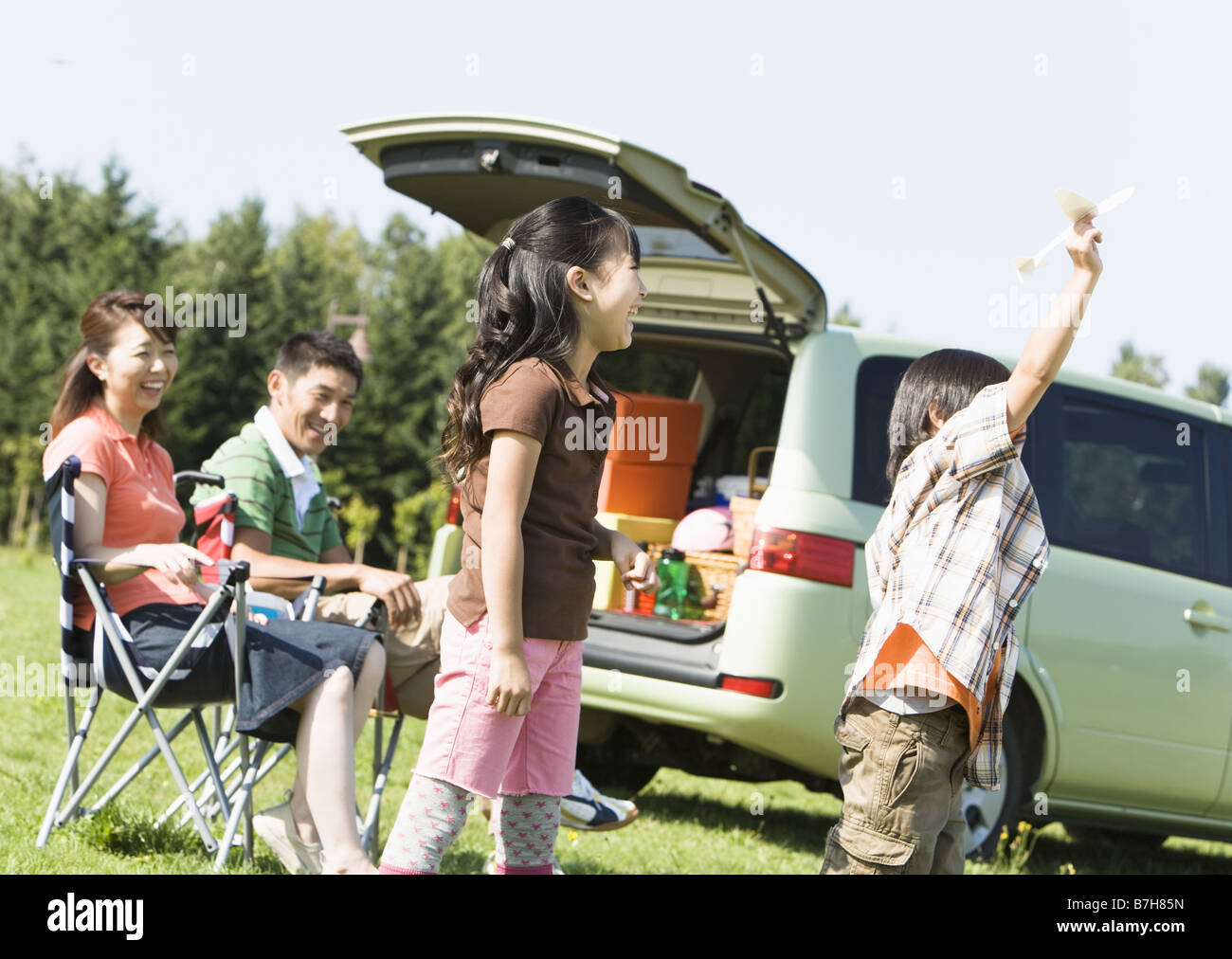 Children playing with toy plane Stock Photo - Alamy