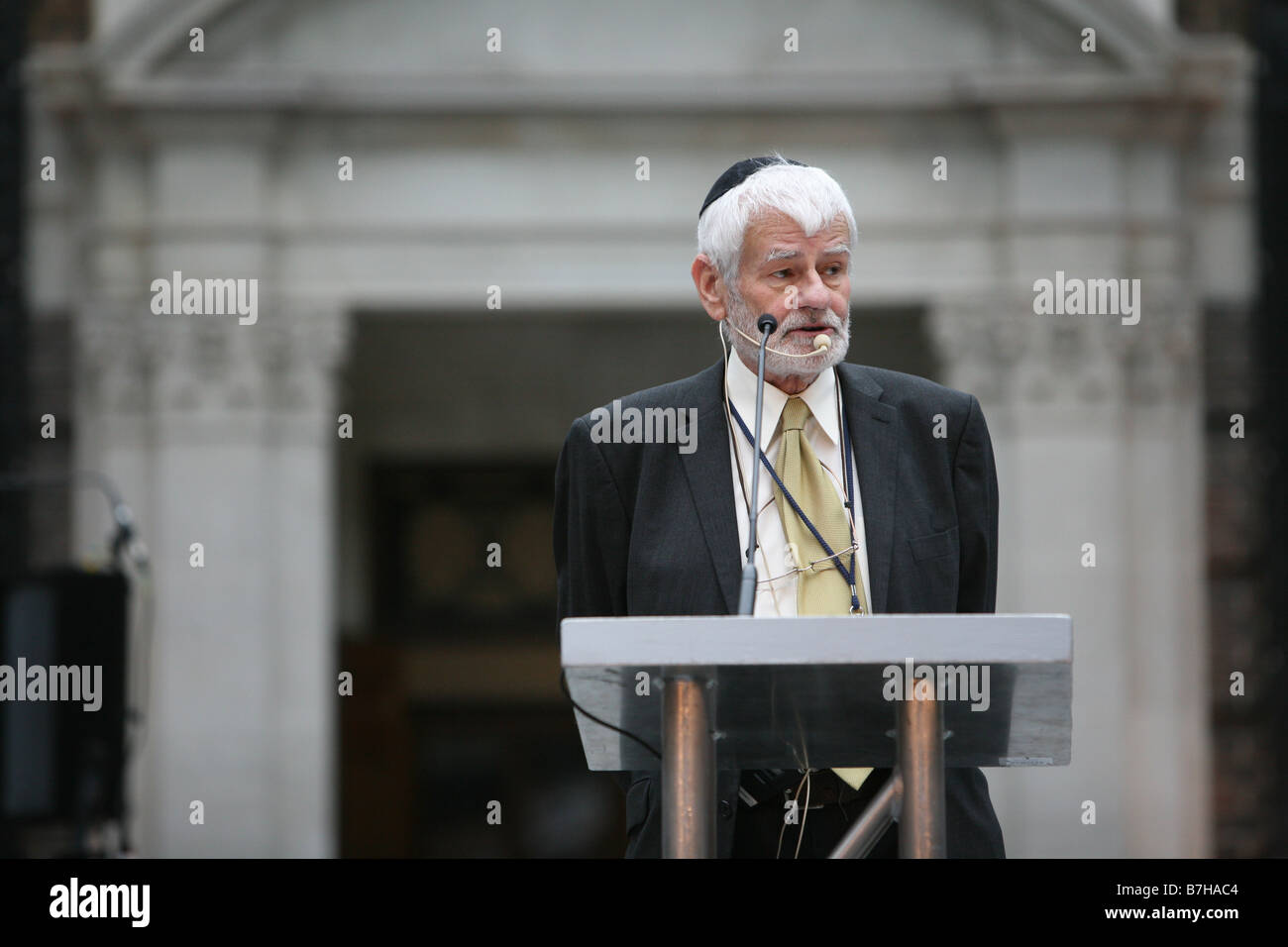 a holocaust survivor gives a speech during the holocaust memorial day ...