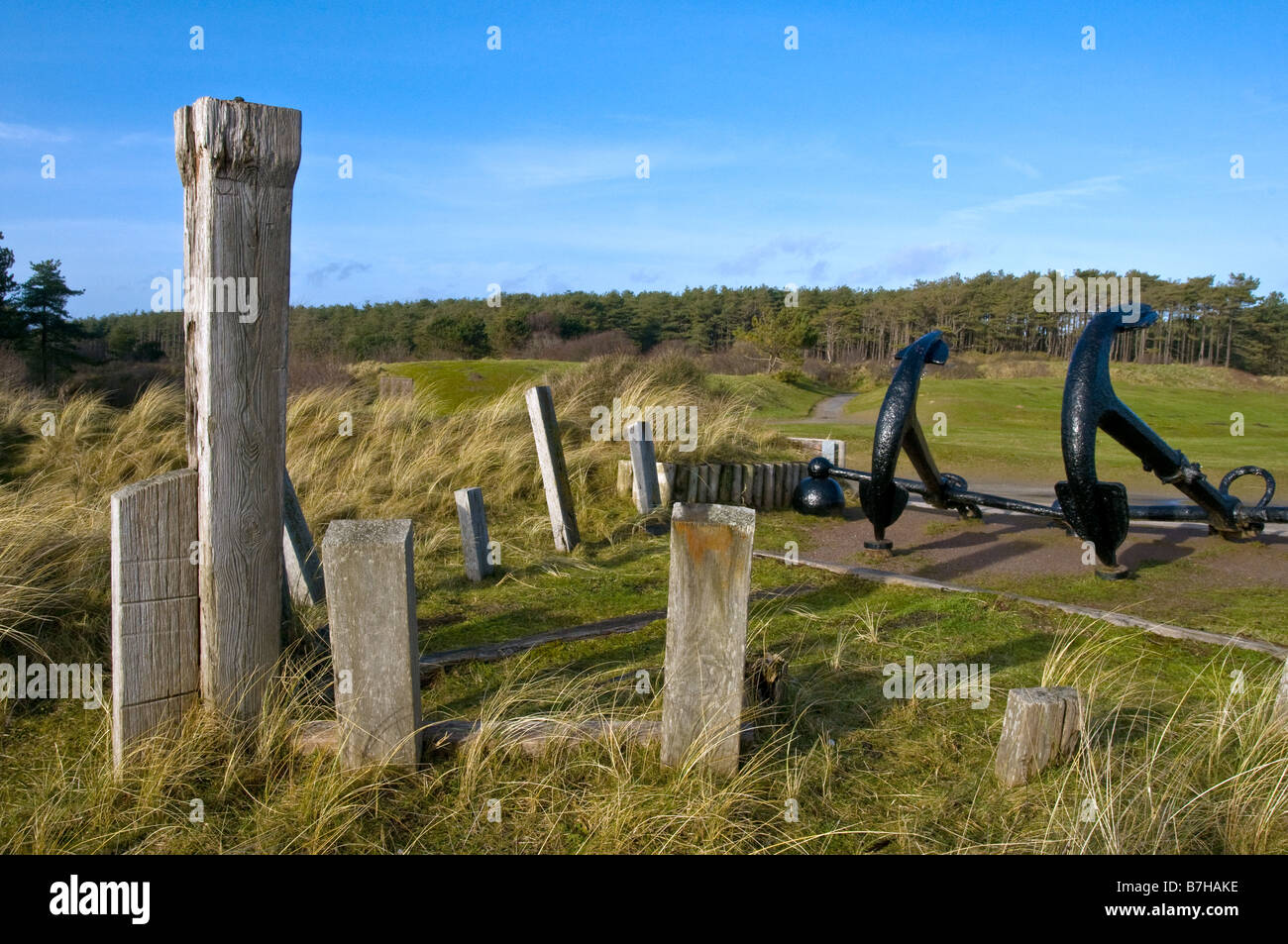 Two ships anchors uncovered on Cefn Sidan Beach at Pembrey in Carmarthenshire south Wales Stock Photo