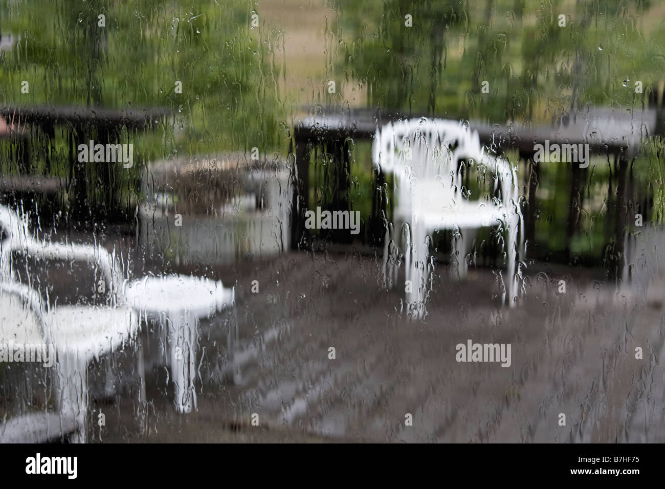 Deck chairs in the rain Stock Photo - Alamy