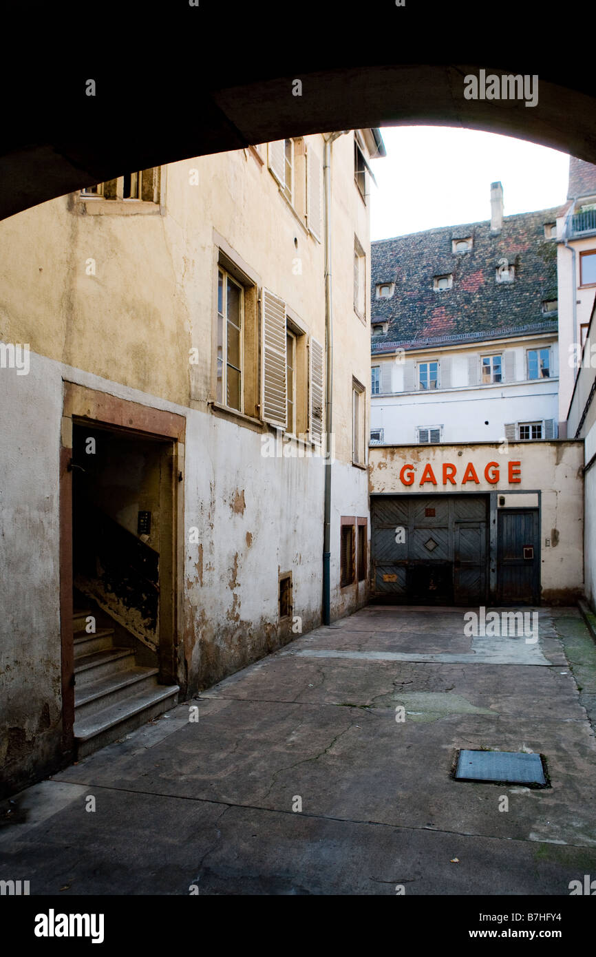 Backyard in the centre of the old town with a garage Stock Photo