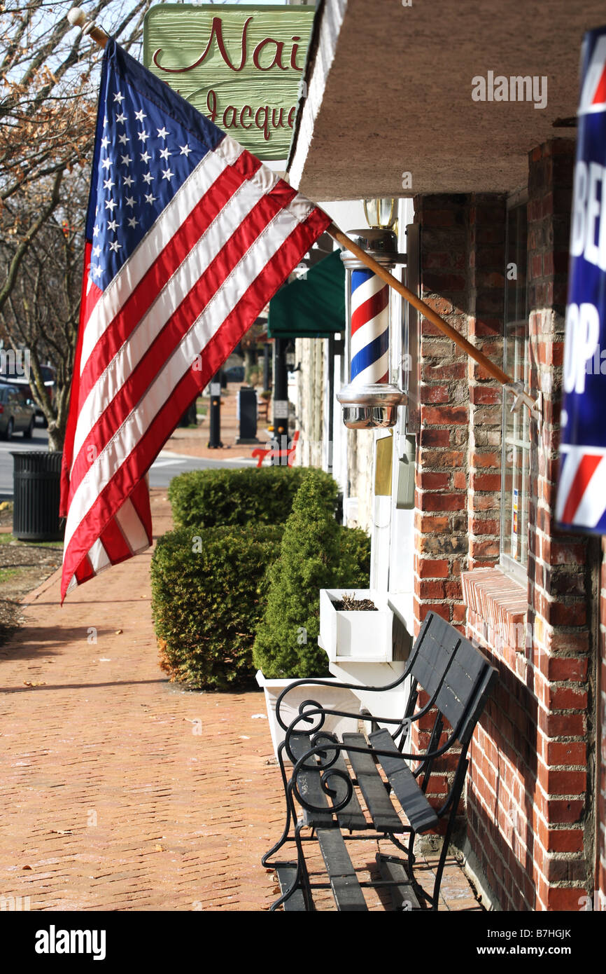 The American Flag flying outside the barber shop in historic downtown