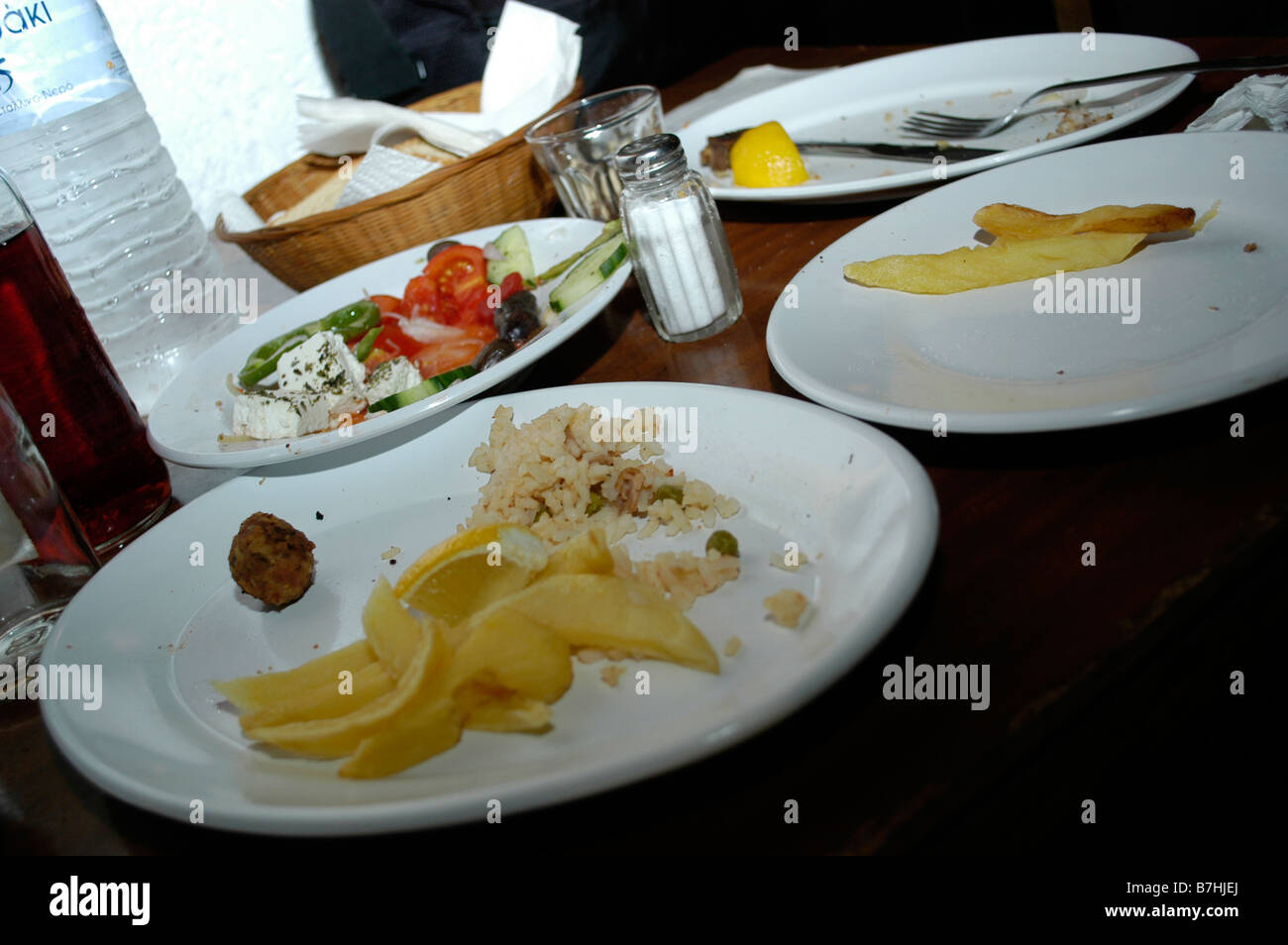 Left over after a dinner in a greek traditional taverna Stock Photo