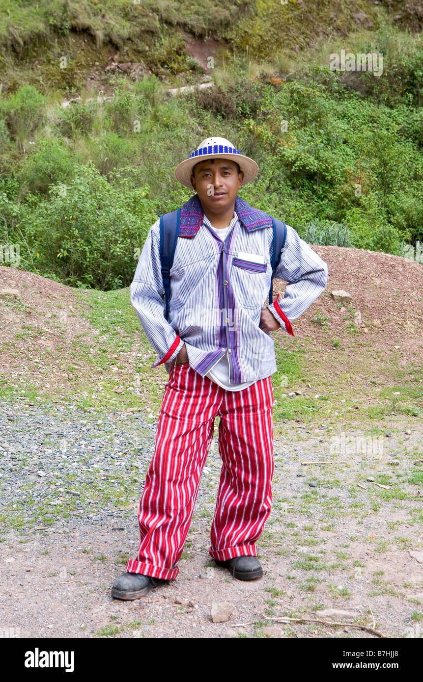Guatemalan man in traditional clothes from Todos Santos poses on the