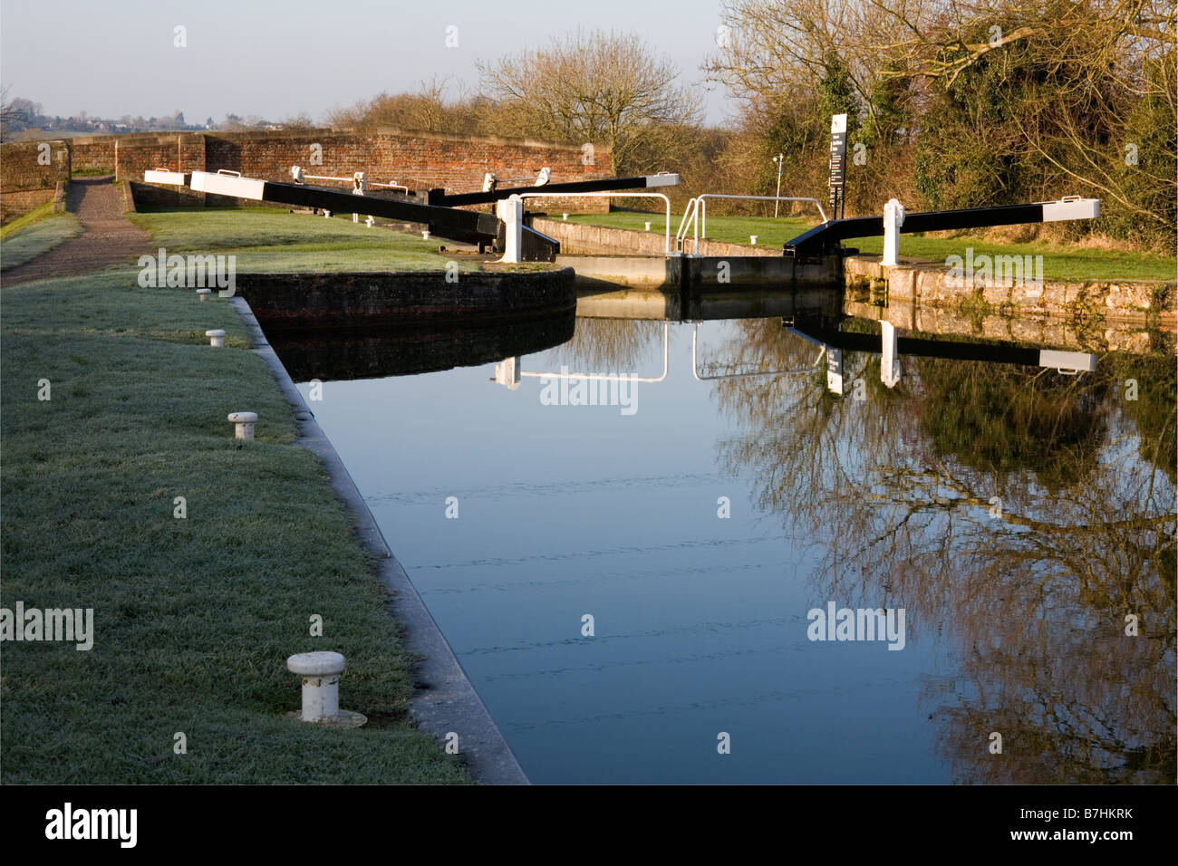 The bottom lock of the Caen Hill flight on the Kennet and Avon Canal near Devizes in Wiltshire England Stock Photo